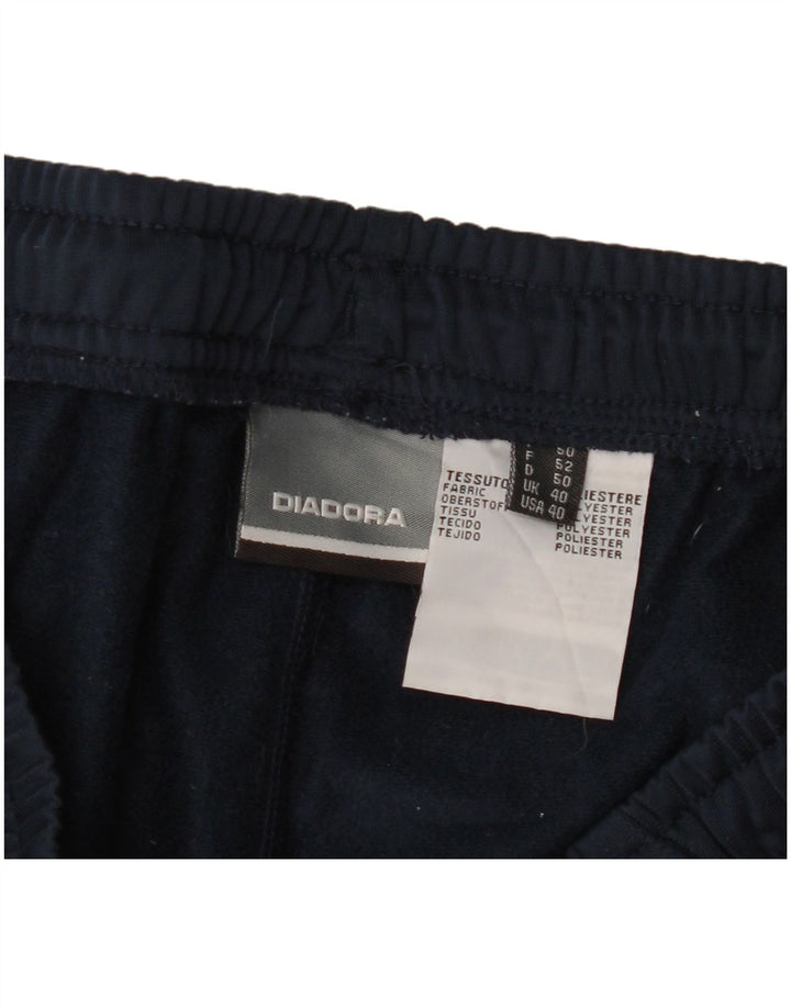 Calça de treino masculina Diadora UK 40 poliéster azul marinho médio