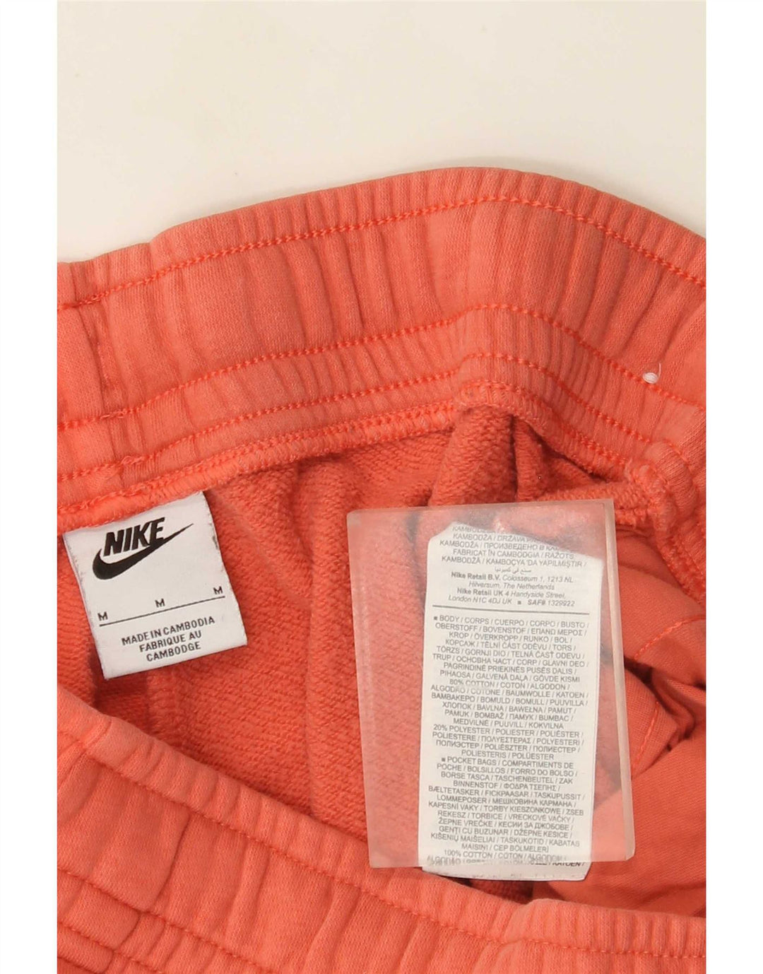 Nike masculino gráfico calças de treino joggers médio laranja algodão