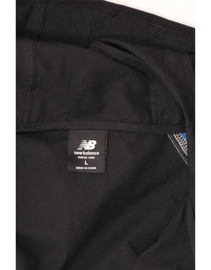 Jaqueta masculina New Balance com agasalho gráfico grande bloco colorido preto