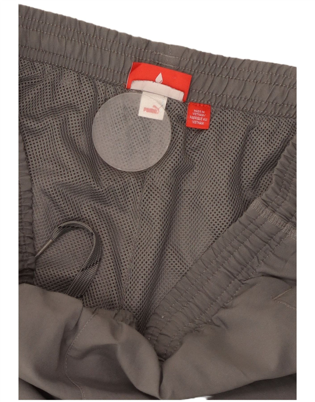 Calça de treino masculina PUMA Graphic Joggers cinza pequeno