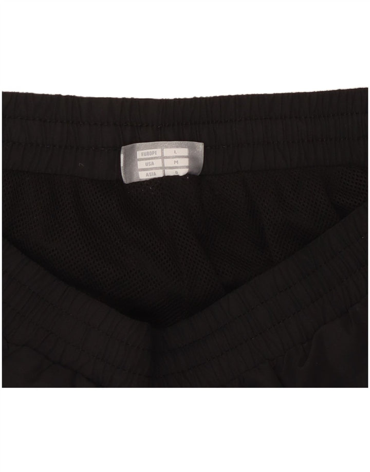 Calça de treino masculina HUMMEL de poliéster preto médio