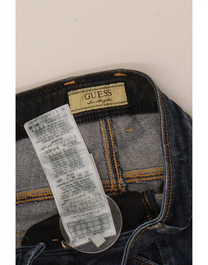 Calça jeans feminina Guess Rocket Distressed W25 L29 azul marinho algodão