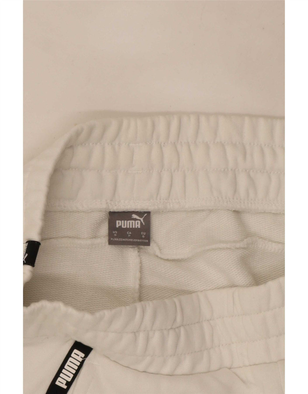Shorts esportivos femininos Puma UK 10 pequenos brancos