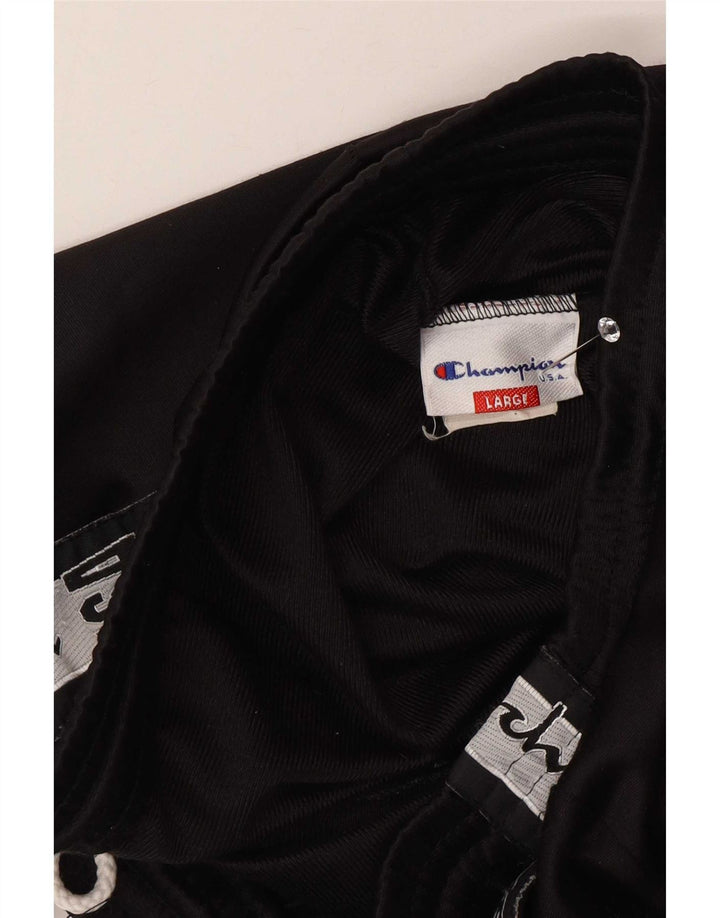 Calça esportiva masculina Champion com estampa gráfica grande em poliéster colorido preto