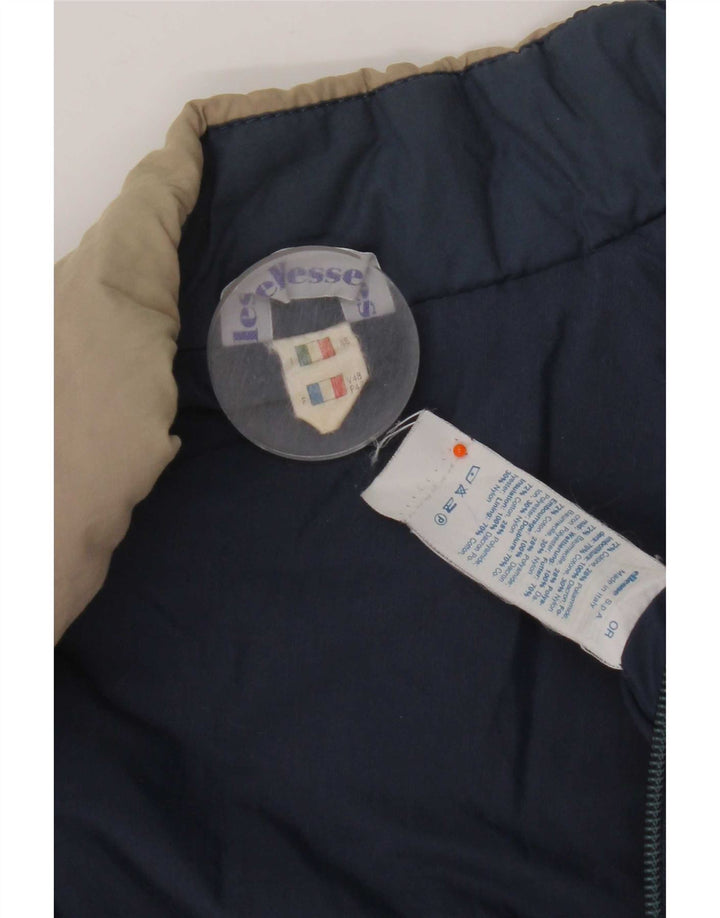 Colete acolchoado masculino Ellesse IT 48 algodão colorblock azul médio