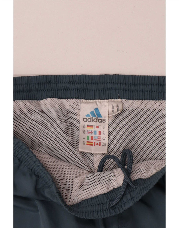Calça de treino feminina Adidas Joggers UK 12 poliéster azul médio