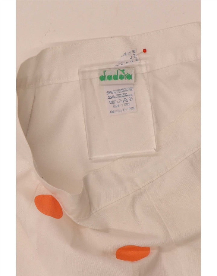 Mini saia feminina Diadora UK 12 médio W26 poliéster de bolinhas brancas