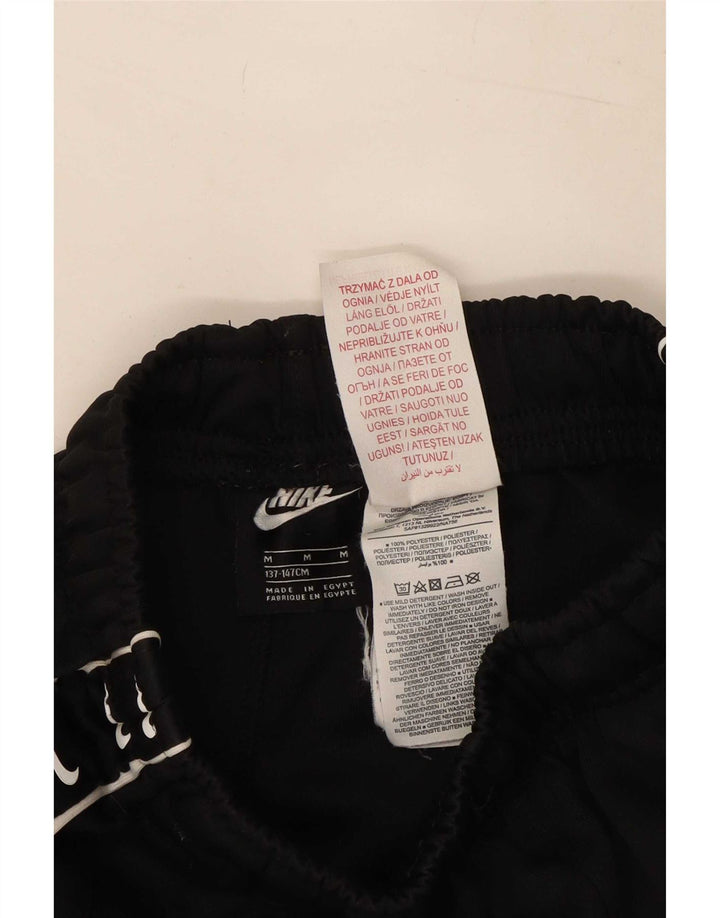 Shorts esportivos gráficos Nike Boys 10-11 anos médio preto poliéster