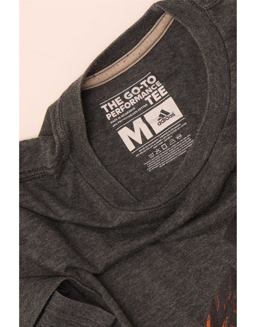 Camiseta masculina Adidas Climalite Graphic Top cinza médio poliéster manchado