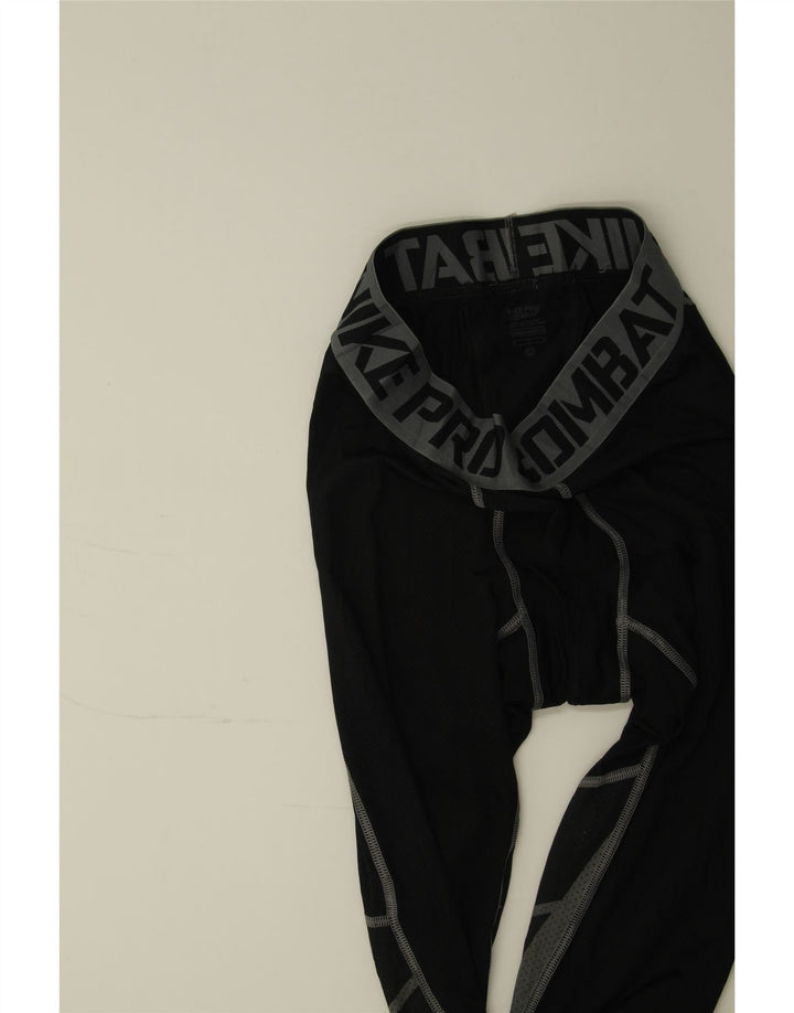NIKE Womens Graphic Capri Leggings UK 14 Medium  Black Colourblock Vintage Nike and Second-Hand Nike from Messina Hembry 