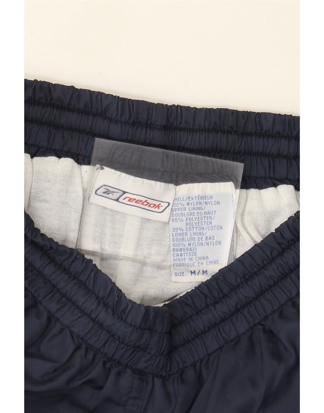 Calça de treino masculina Reebok médio azul marinho nylon