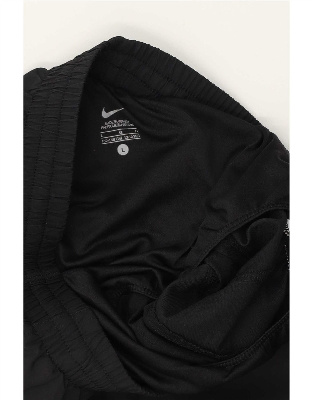 Shorts esportivos gráficos Nike Boys 12-13 anos grandes pretos