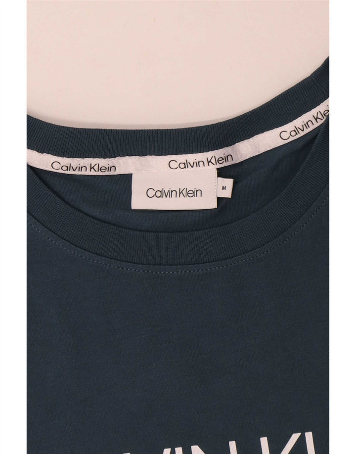 Calvin Klein Camiseta masculina gráfica Top médio algodão azul marinho