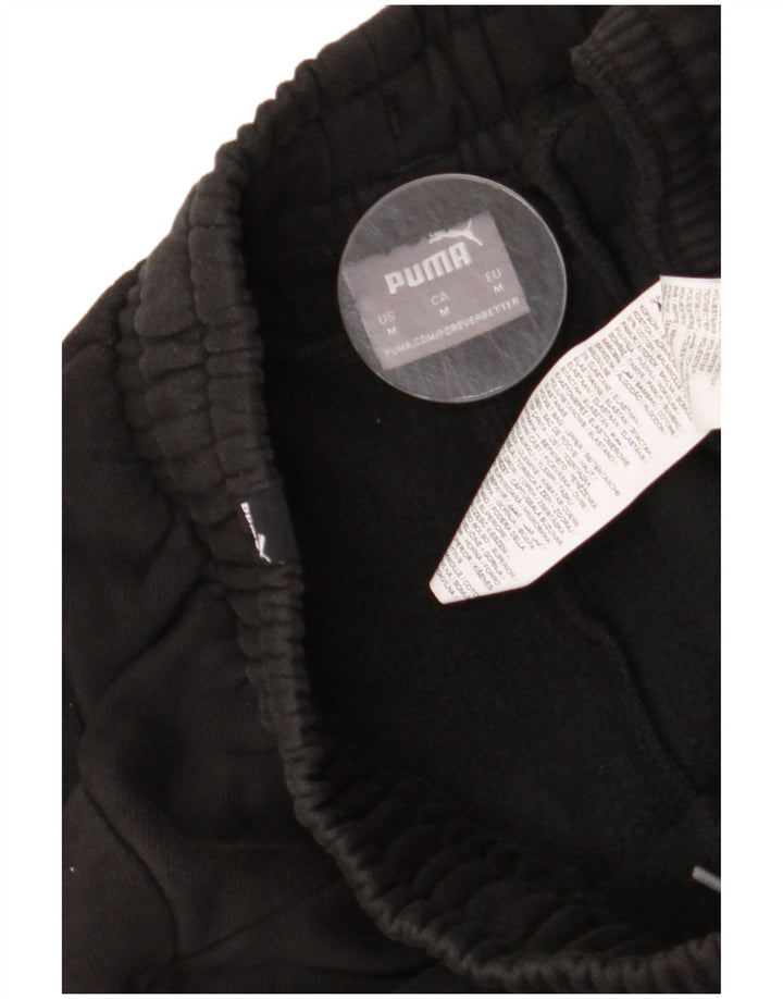 Calça de treino masculina Puma Graphic Joggers médio preto