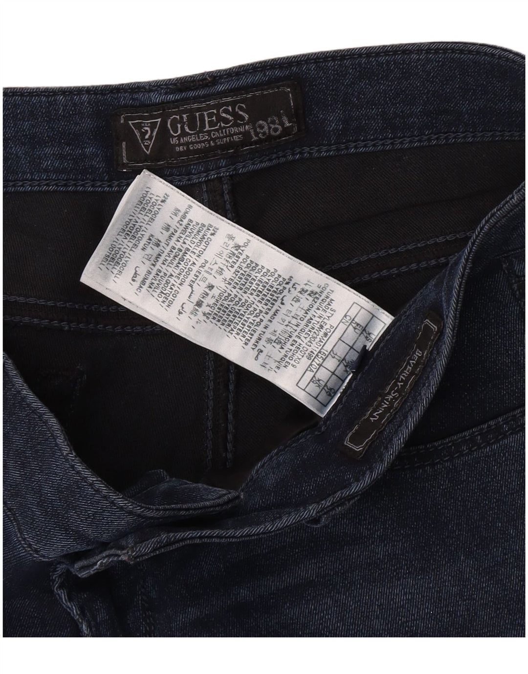 Calça jeans feminina Guess Beverly Distressed W29 L27 azul poliéster