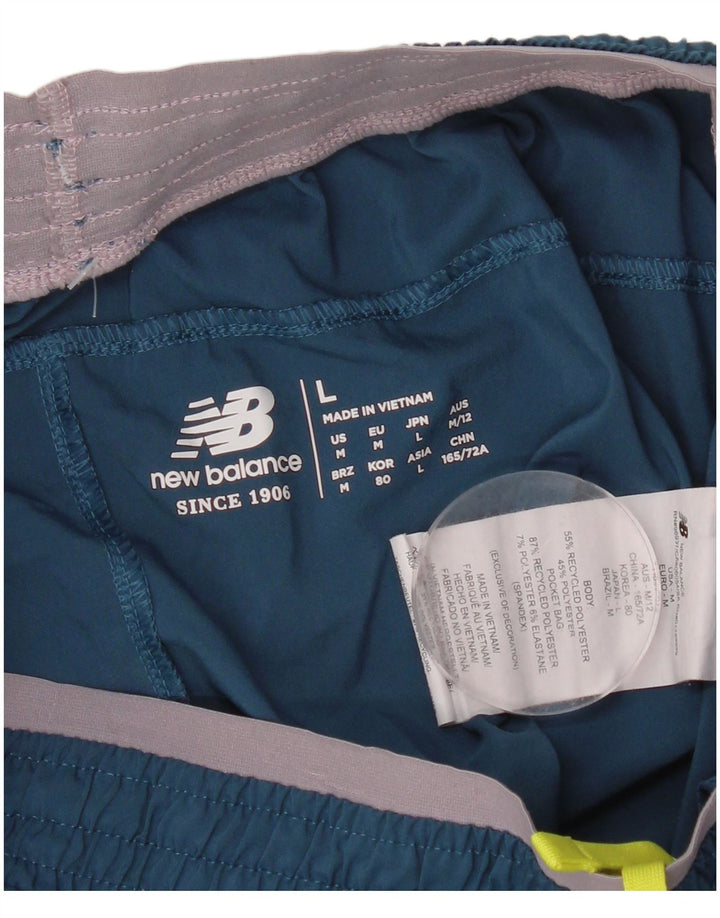 Shorts esportivos gráficos femininos New Balance UK 14 poliéster azul médio