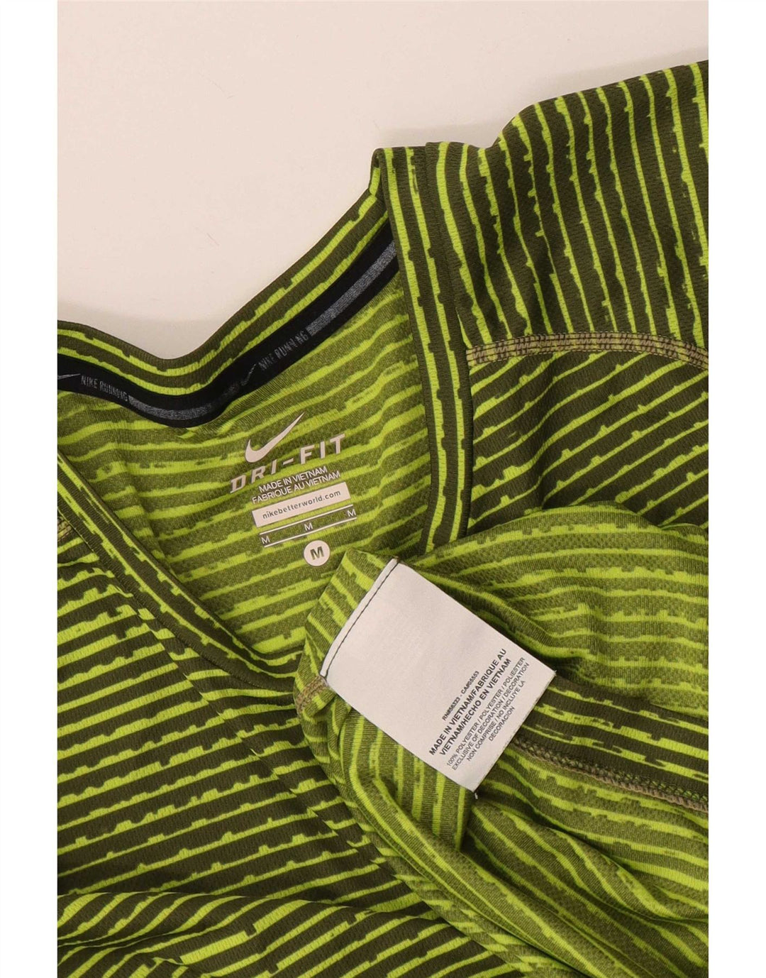 Camiseta feminina Nike Dri Fit Top UK 14 poliéster listrado verde médio