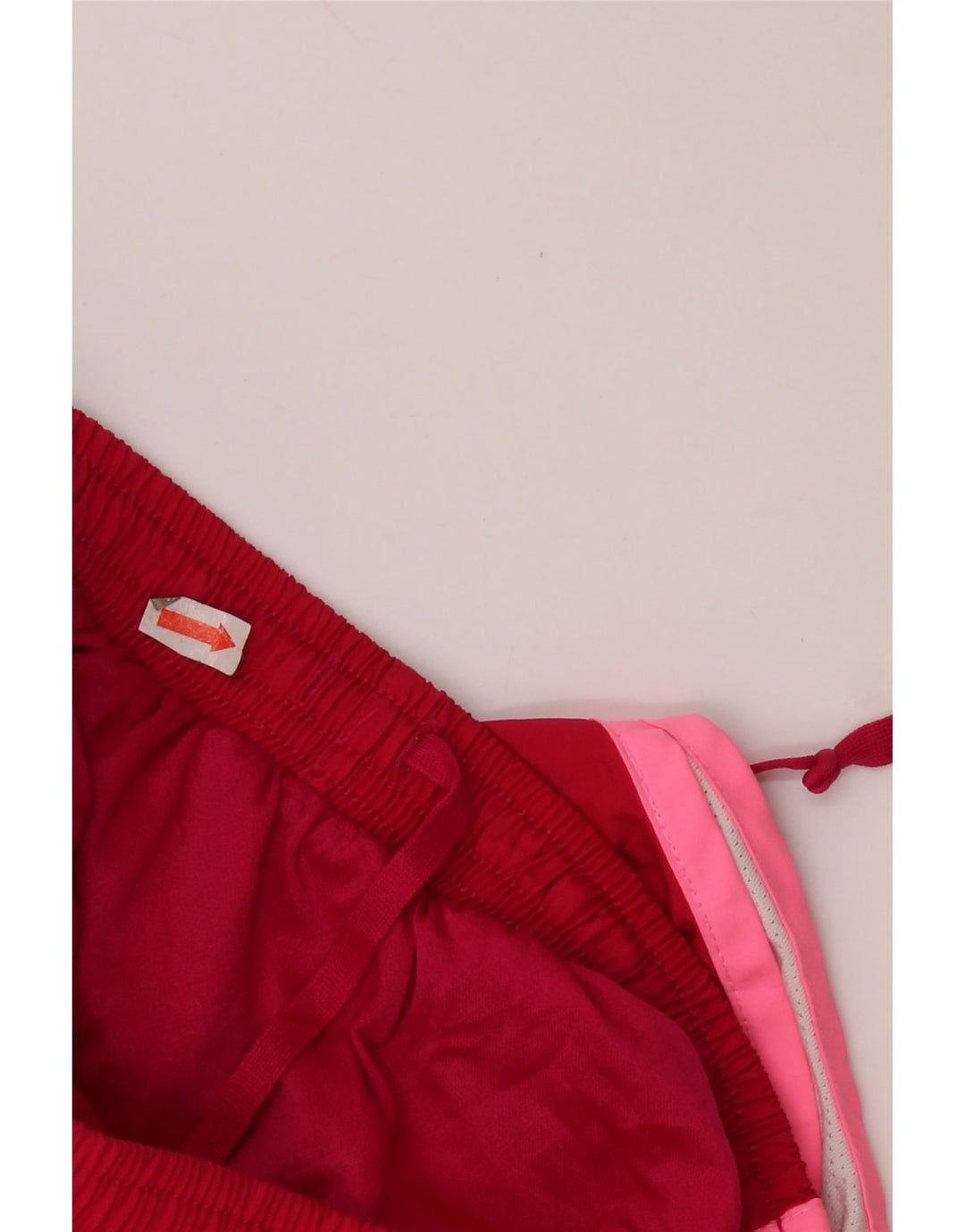 Shorts esportivos femininos NIKE Dri Fit UK 10 pequeno vermelho colorblock poliéster