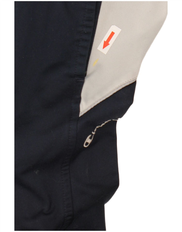 Calça de treino masculina Champion pequena azul marinho colorblock poliéster