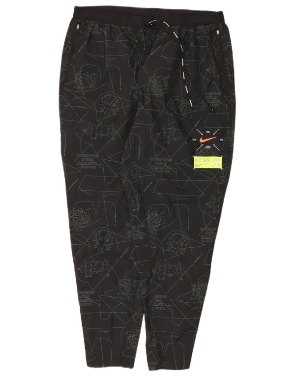 Calça de treino feminina Nike Dri Fit com padrão abstrato UK 18 XL preta