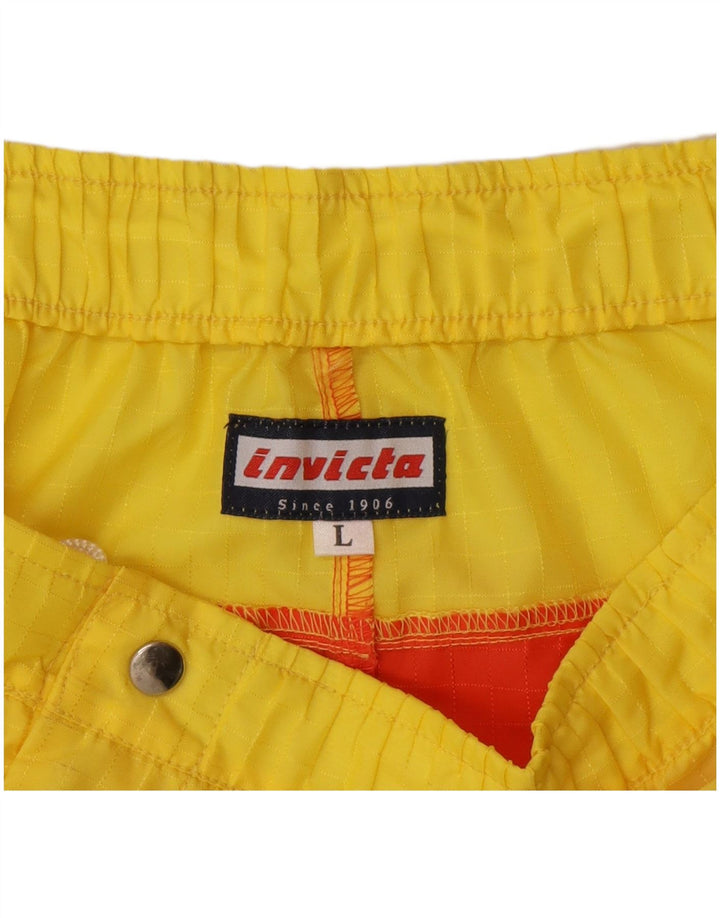 Roupa de banho masculina Invicta grande bloco colorido amarelo