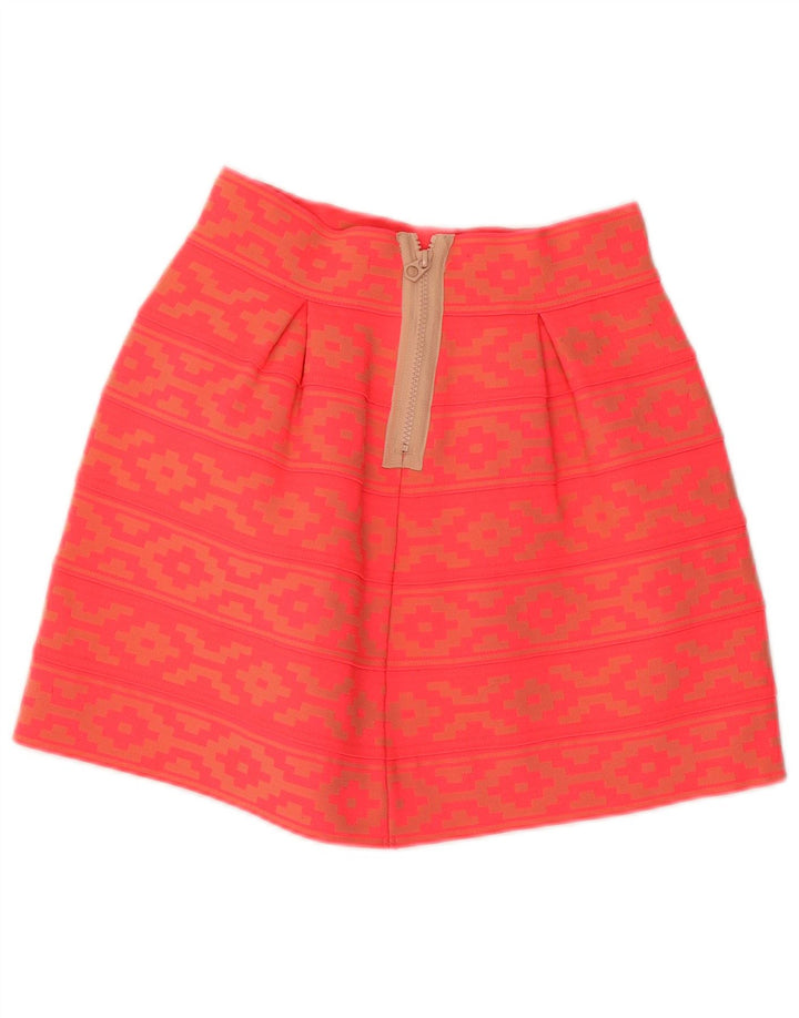 Saia feminina vintage evasê UK 14 médio W28 poliéster geométrico laranja