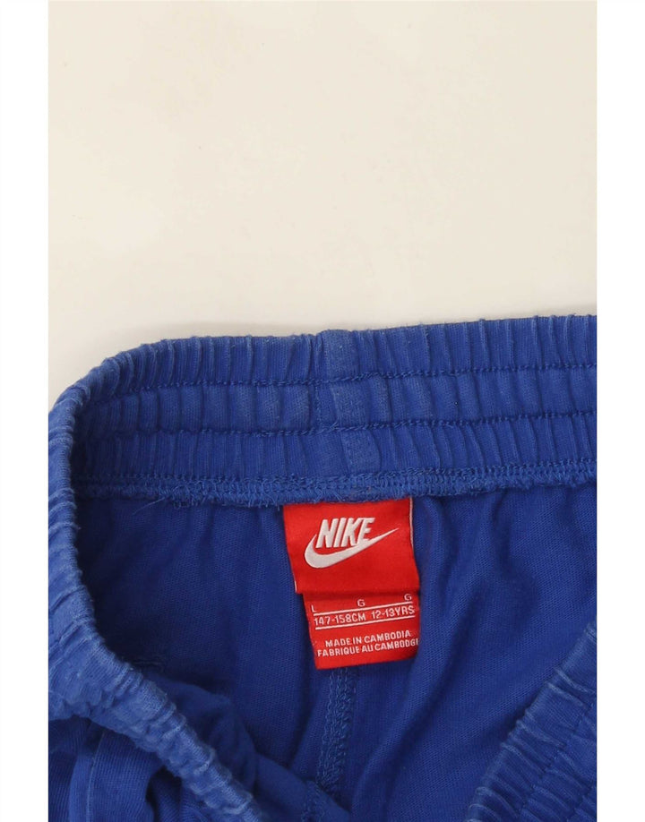 Shorts esportivos gráficos Nike Boys 12-13 anos grandes azuis