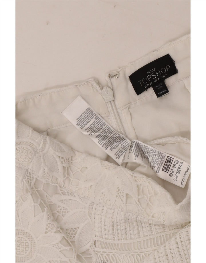 Mini saia feminina Topshop Reino Unido 8 pequena W28 poliéster floral branco