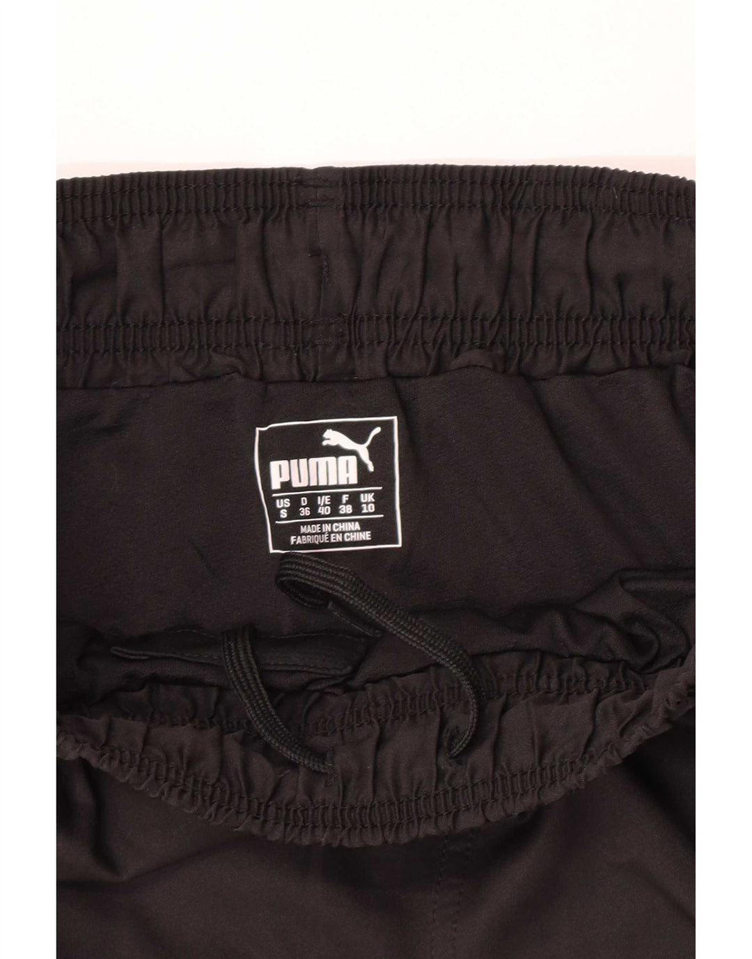 Shorts esportivos femininos Puma UK 10 pequenos pretos