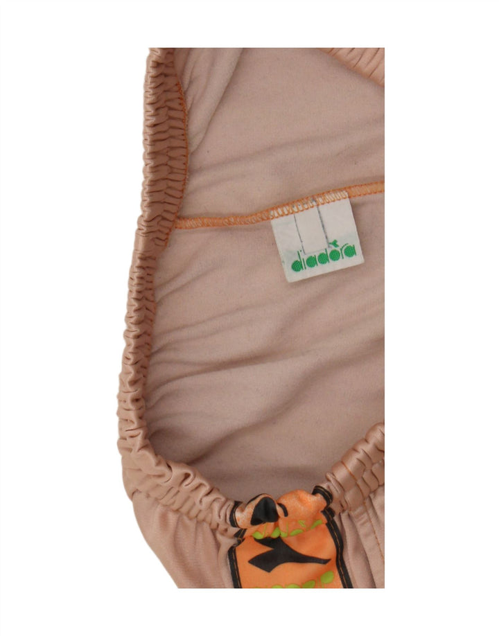 Shorts esportivos femininos Diadora UK 12 médio laranja