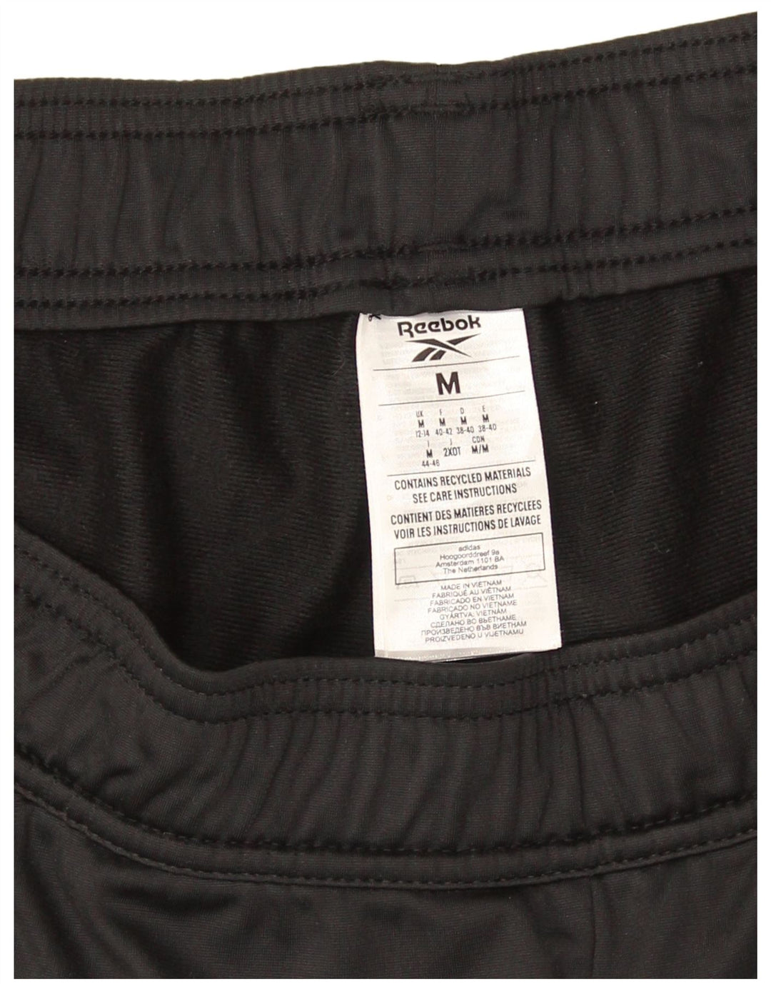 Calça de treino feminina Reebok Joggers UK 12/14 médio preto poliéster