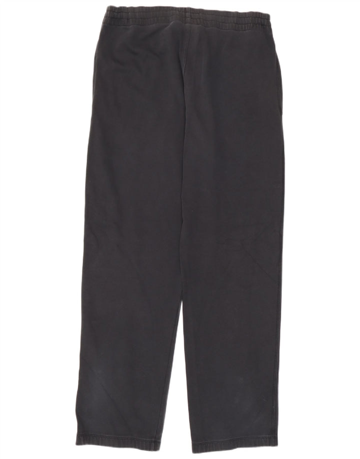 Calça de treino Nike masculina gráfica média de algodão preto