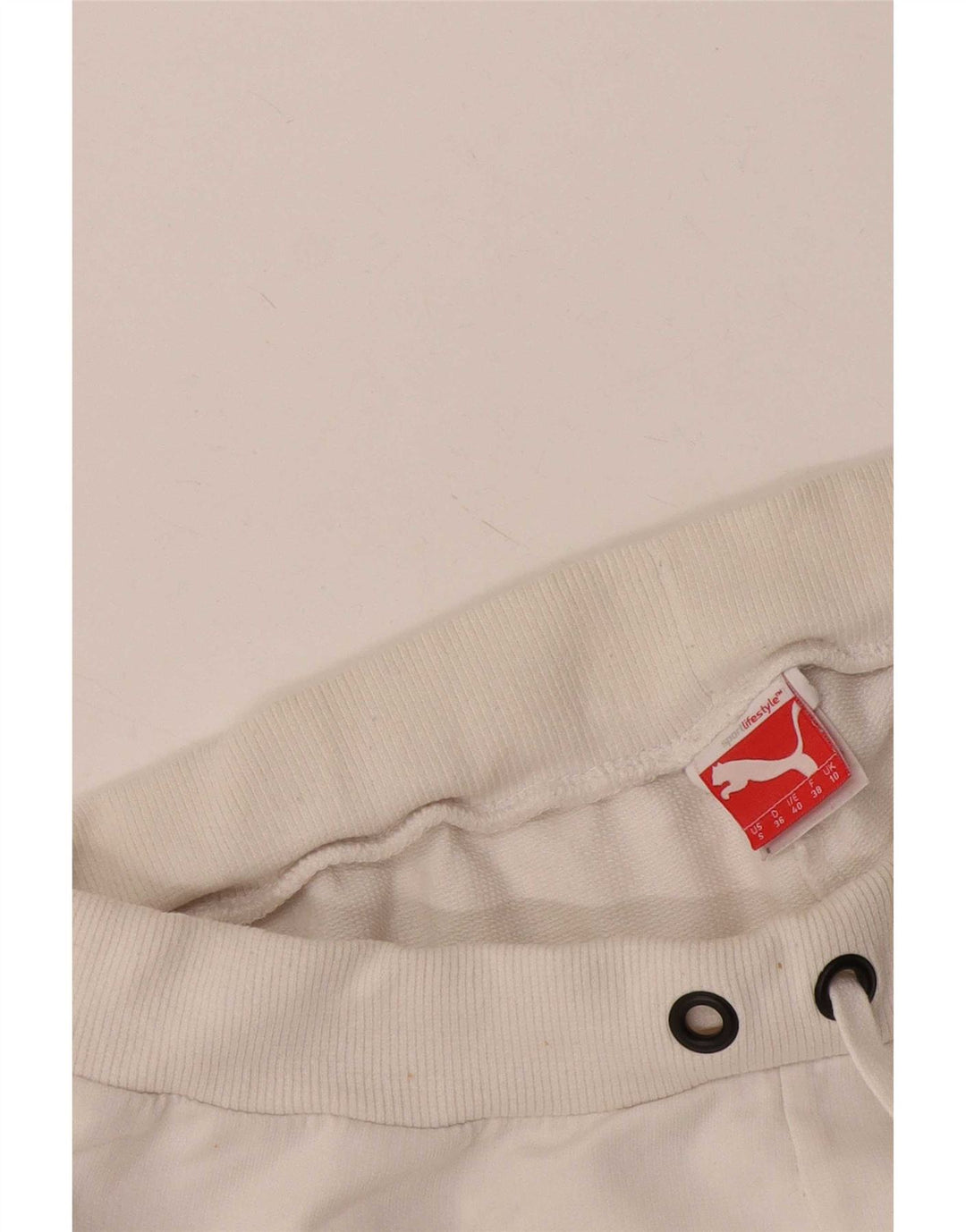 Shorts esportivos femininos Puma UK 10 pequenos brancos