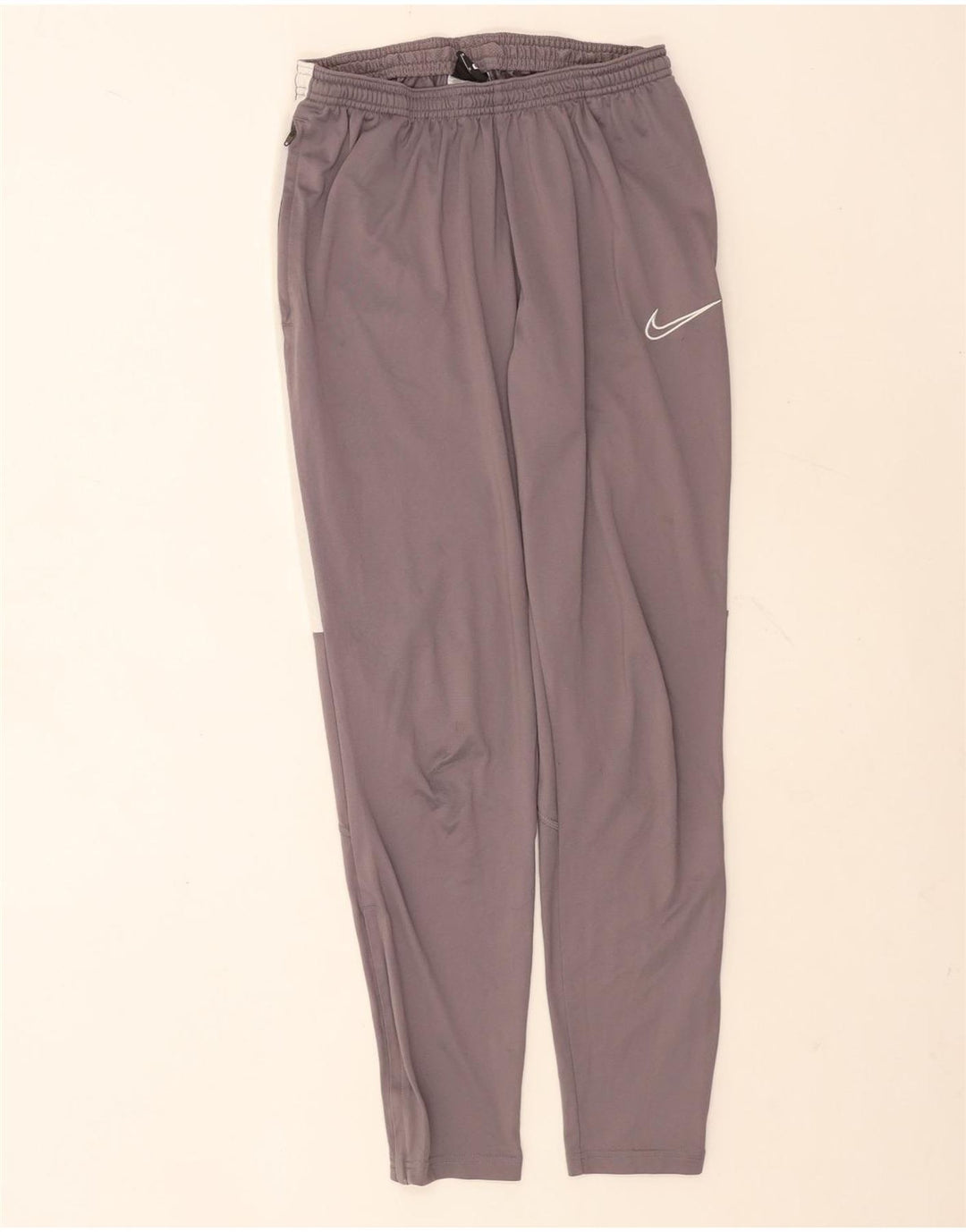 Calça de treino masculina Nike Dri Fit cinza médio colorblock poliéster