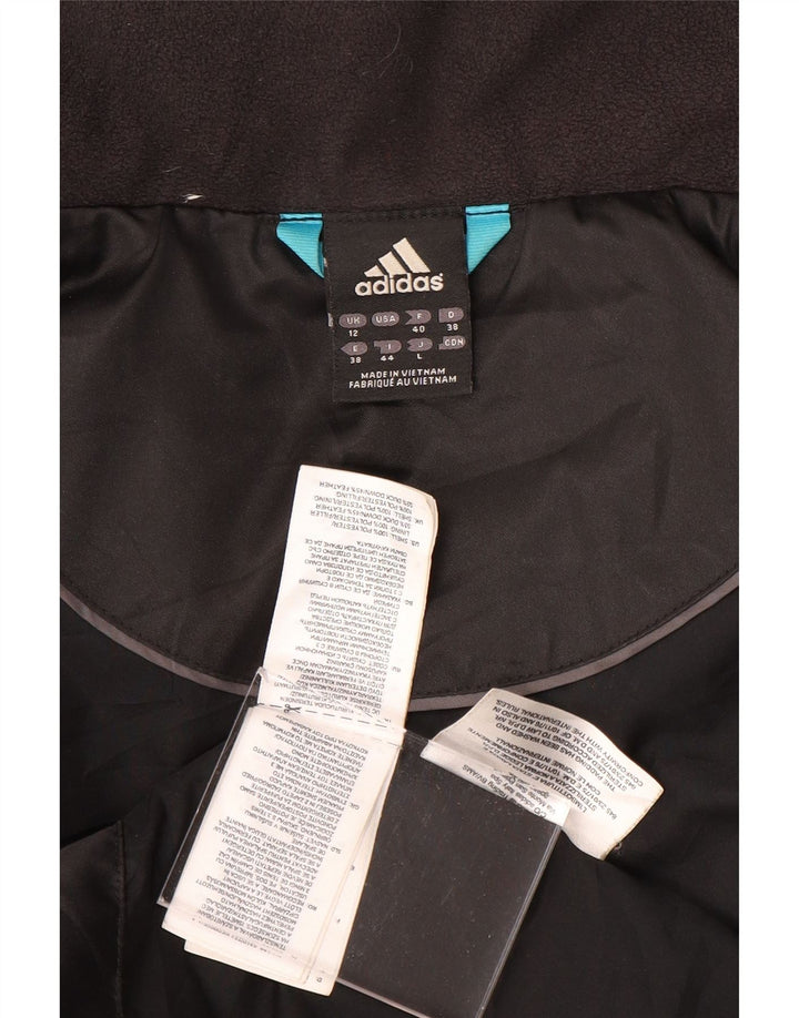 Casaco acolchoado feminino Adidas UK 12 poliéster preto médio