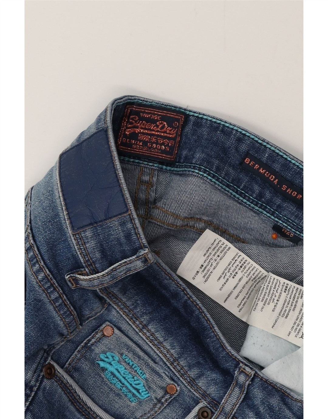 Bermuda jeans feminina SUPERDRY W26 pequeno algodão azul
