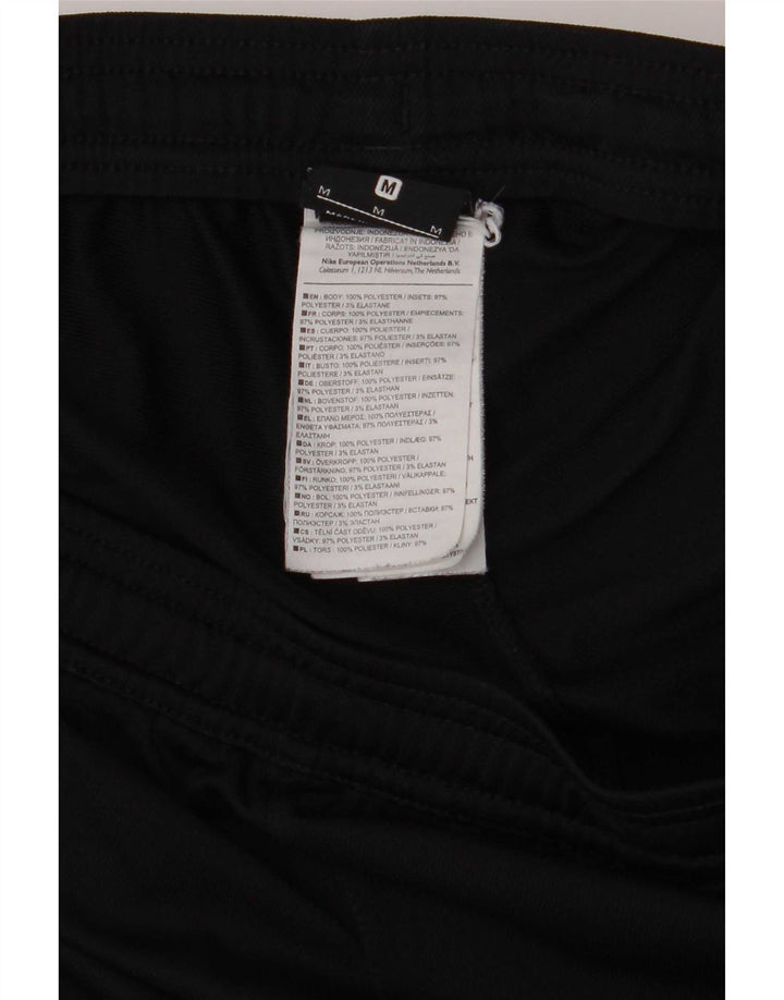 Calça de treino masculina Nike médio preto colorblock poliéster