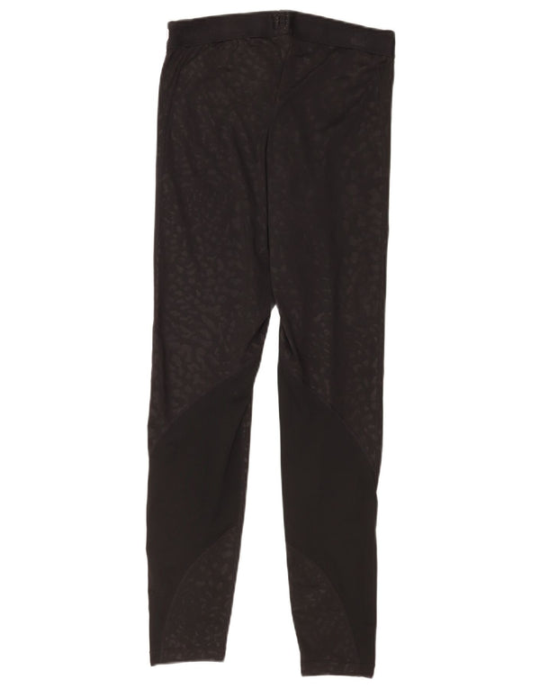 Leggings femininas Nike Dri Fit Graphic médio preto com estampa animal esportiva
