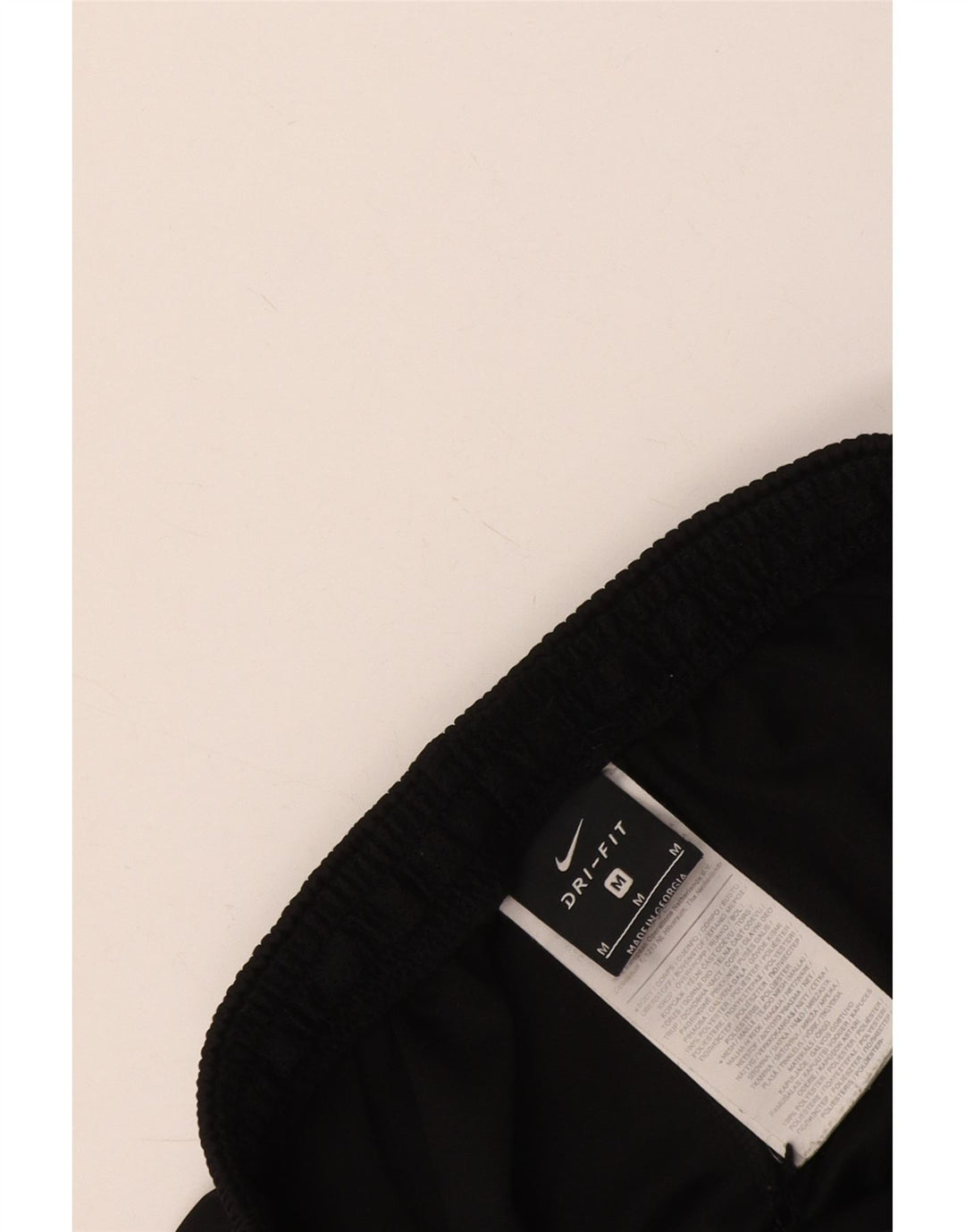 Calça de treino masculina Nike Dri Fit médio preto colorblock poliéster