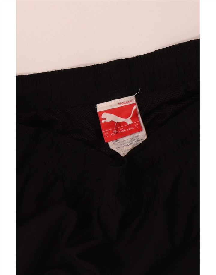 Calça de treino masculina Puma Graphic grande poliéster preto