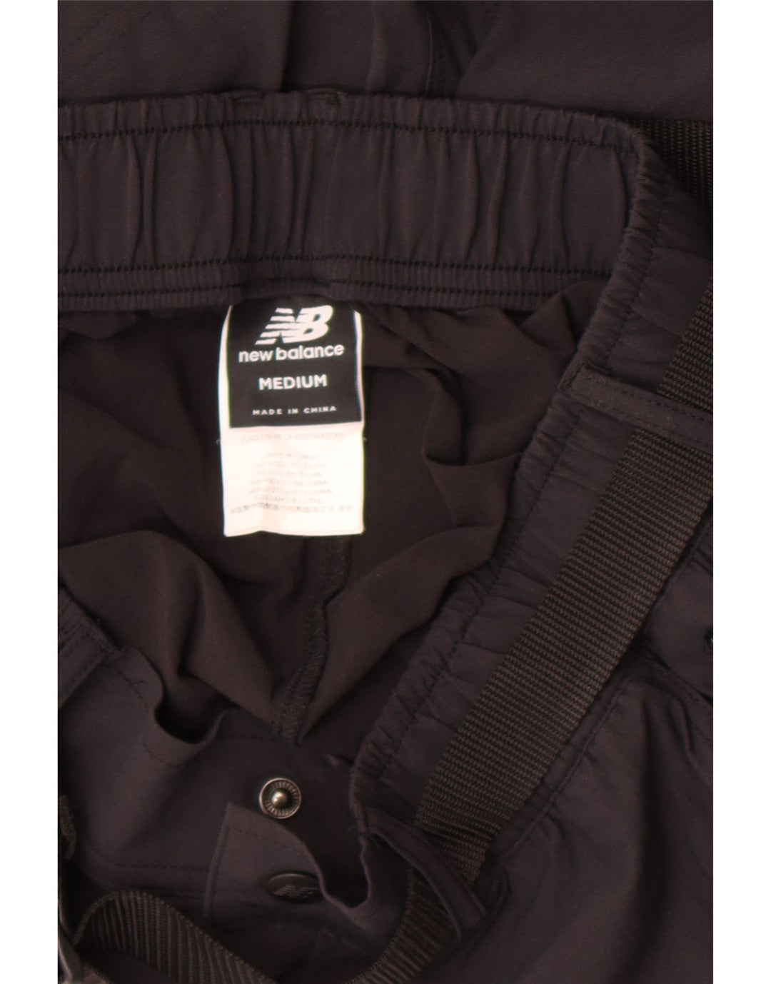 Calça reta masculina New Balance médio W30 L30 nylon preto