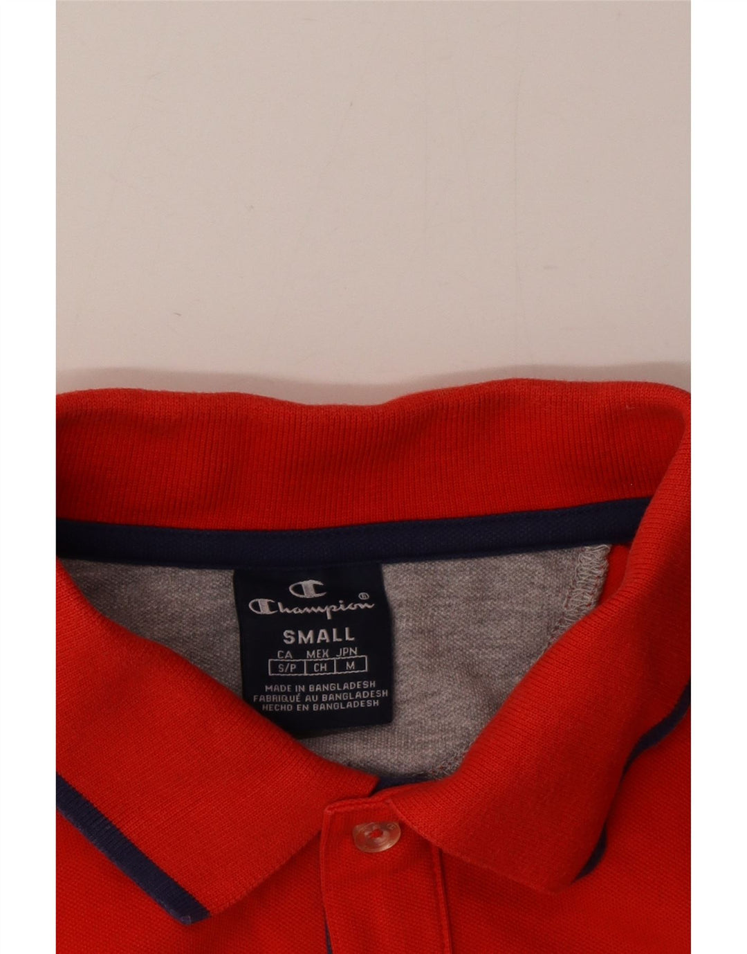 Camisa polo masculina Champion pequena vermelha