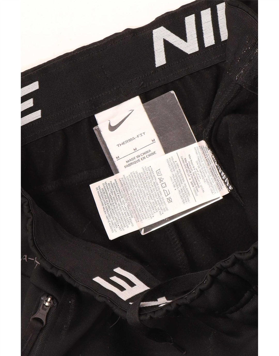 Calça de treino masculina Nike Therma-Fit de poliéster médio preto
