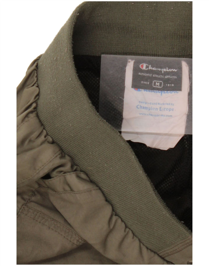 Calça de treino feminina CHAMPION Joggers UK 14 poliéster verde médio