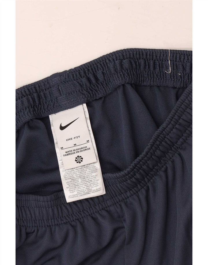 Calça de treino masculina Nike médio azul marinho colorblock poliéster esportivo