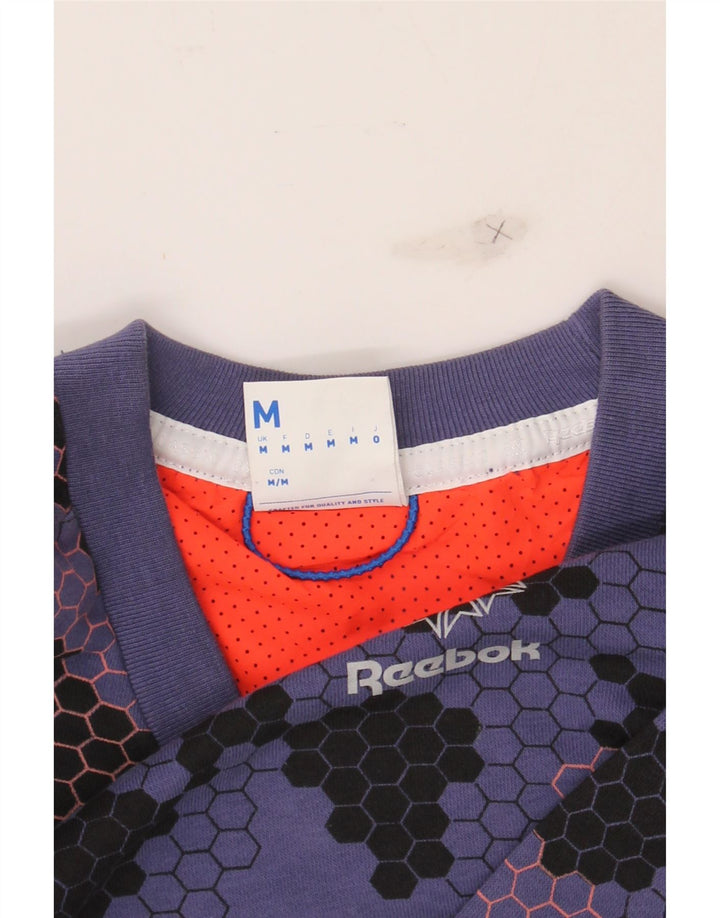 REEBOK Womens Sweatshirt Jumper UK 14 Medium Purple Geometric Cotton Vintage Reebok and Second-Hand Reebok from Messina Hembry 