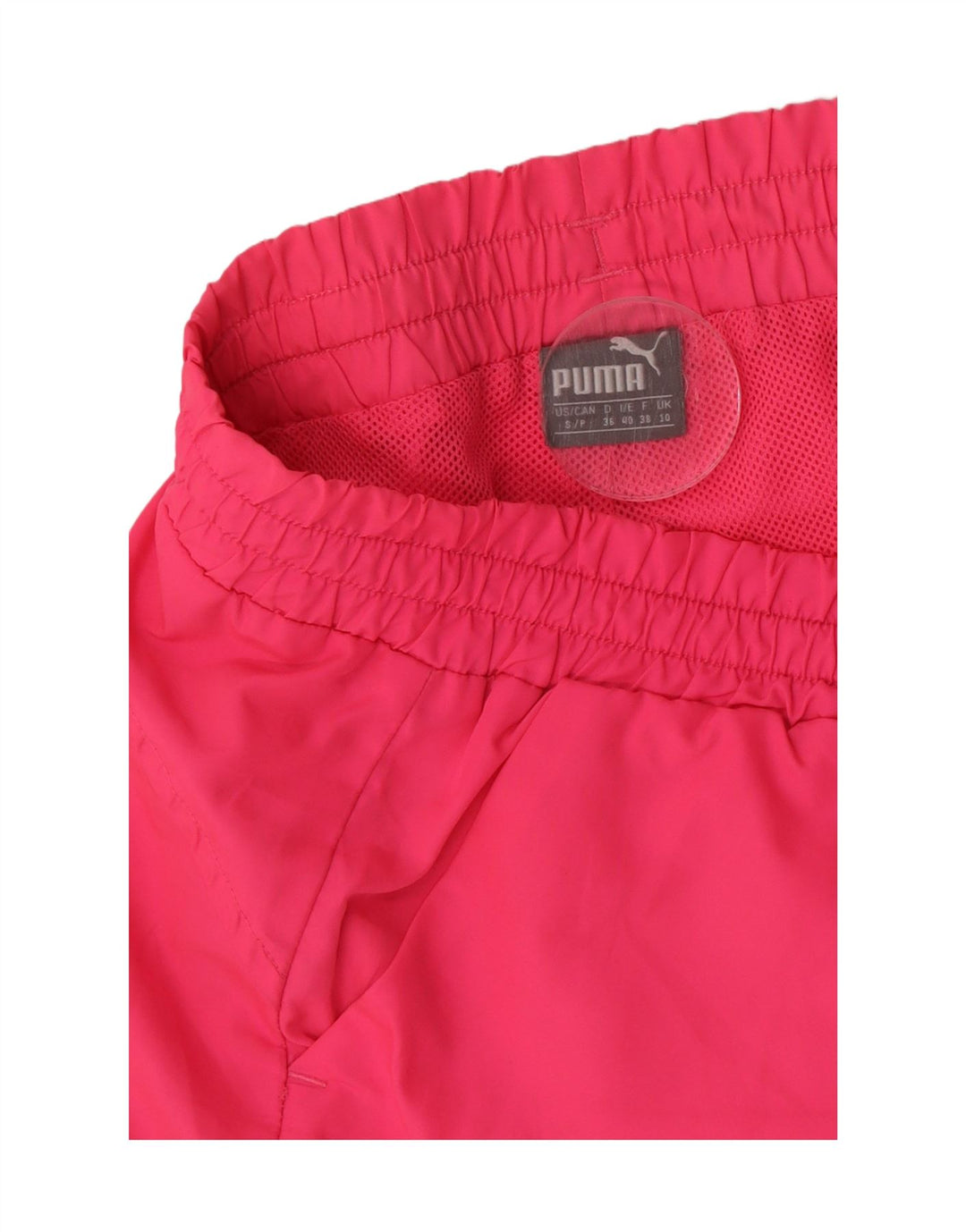 Shorts esportivos femininos Puma UK 10 pequeno poliéster rosa