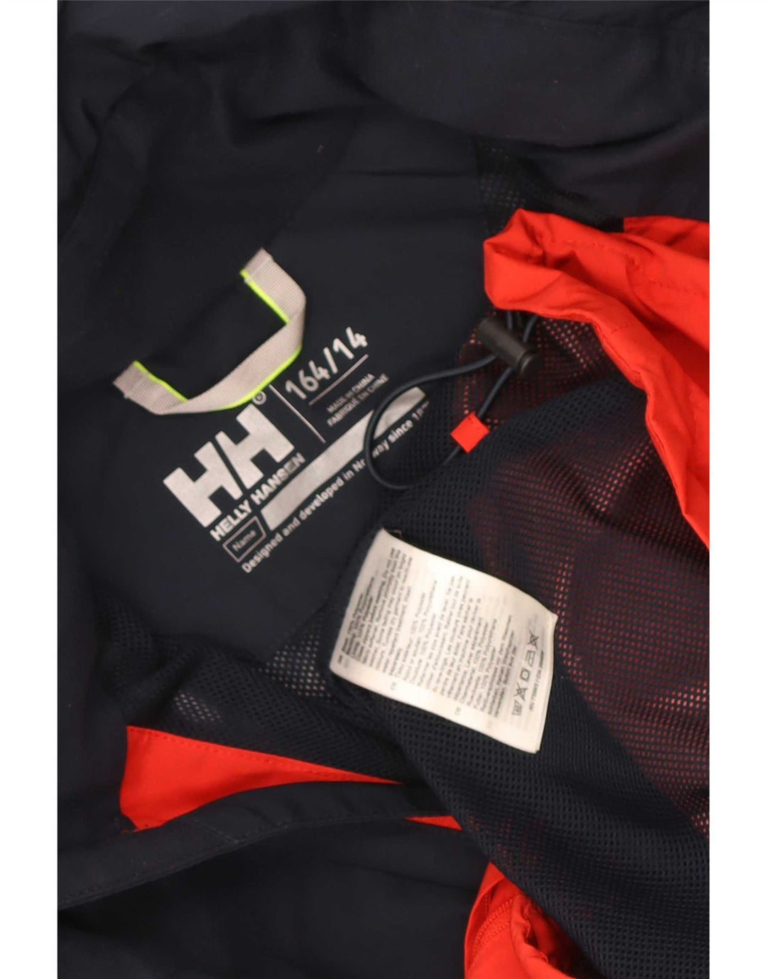 Jaqueta de chuva gráfica Helly Hansen Boys 13-14 anos azul marinho bloco colorido