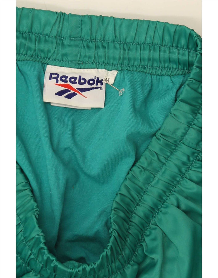 Shorts esportivos masculinos Reebok médio verde nylon