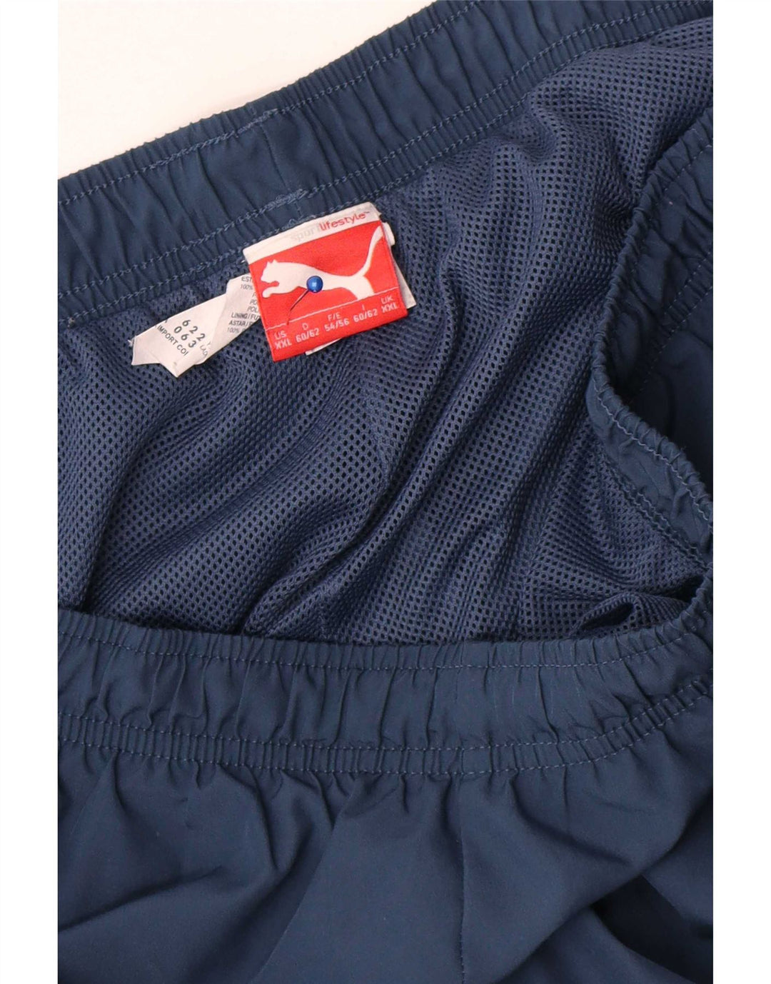 Calça de treino masculina Puma Graphic Capri 2XL azul marinho poliéster
